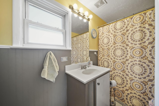 124 Broad St, Brooklyn, MI 49230 - bathroom with visible vents and vanity