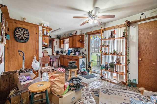 interior space with a ceiling fan