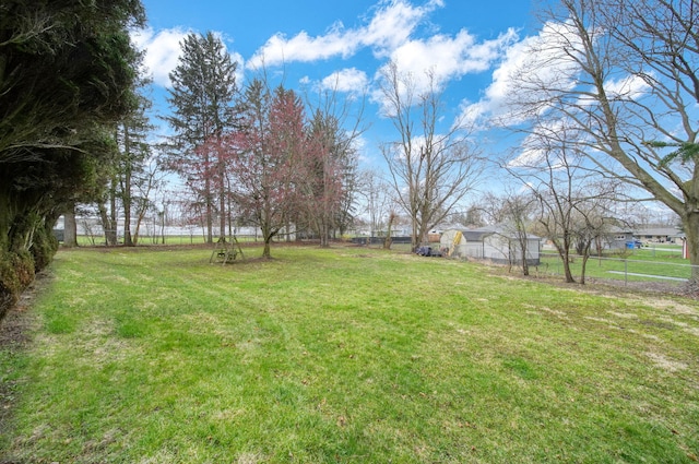 view of yard featuring fence