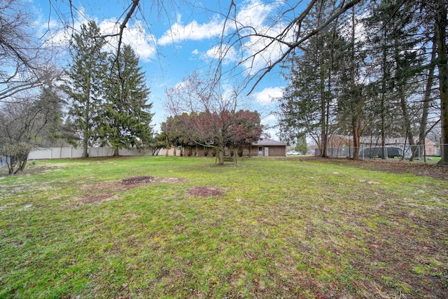 view of yard featuring fence