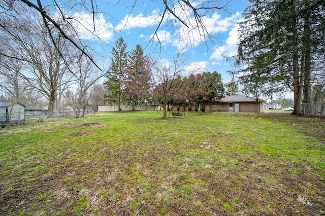 view of yard featuring fence