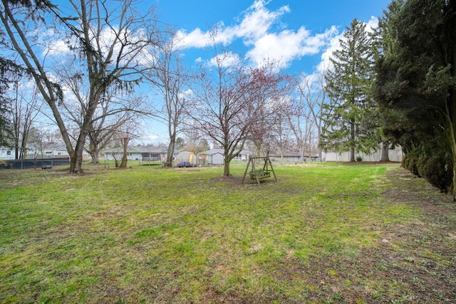 view of yard featuring fence