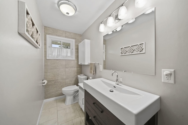 full bath featuring marble finish floor, toilet, and vanity