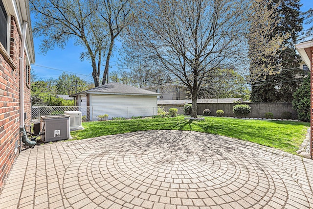 view of patio / terrace featuring an outdoor structure, a fenced backyard, and central air condition unit