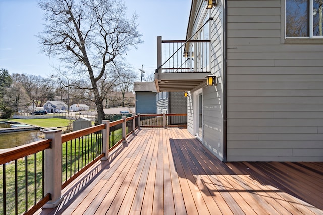 wooden terrace featuring a residential view