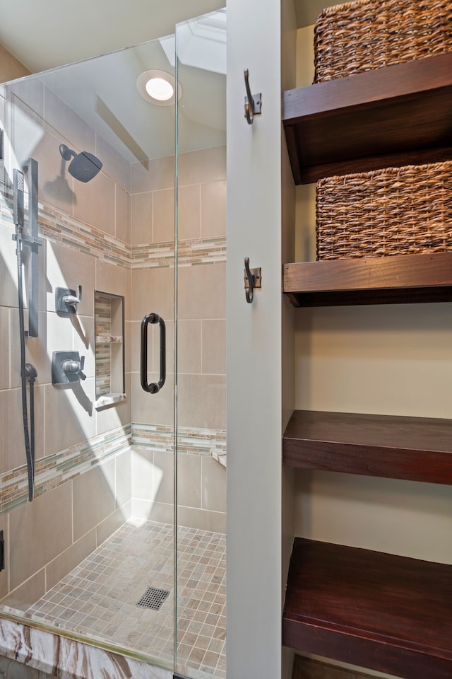 full bathroom featuring a stall shower