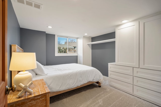 bedroom featuring recessed lighting, carpet floors, and visible vents
