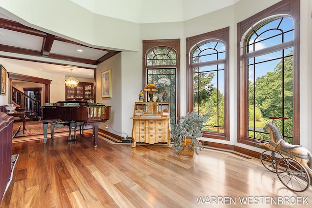 3550 64th Ave, Zeeland, MI 49464 - foyer entrance with wood finished floors, healthy amount of natural light, stairs, recessed lighting, and beam ceiling