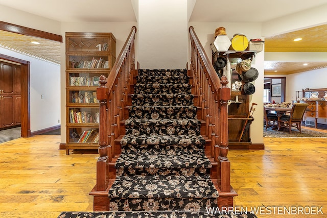 3550 64th Ave, Zeeland, MI 49464 - stairway with hardwood / wood-style floors and recessed lighting