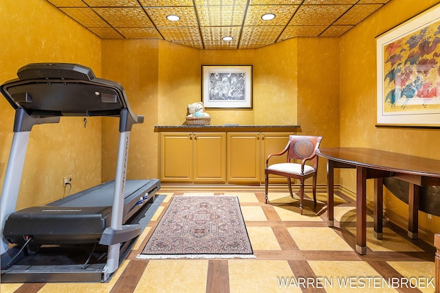3550 64th Ave, Zeeland, MI 49464 - exercise area with an ornate ceiling, a textured wall, inlaid floor details, and recessed lighting