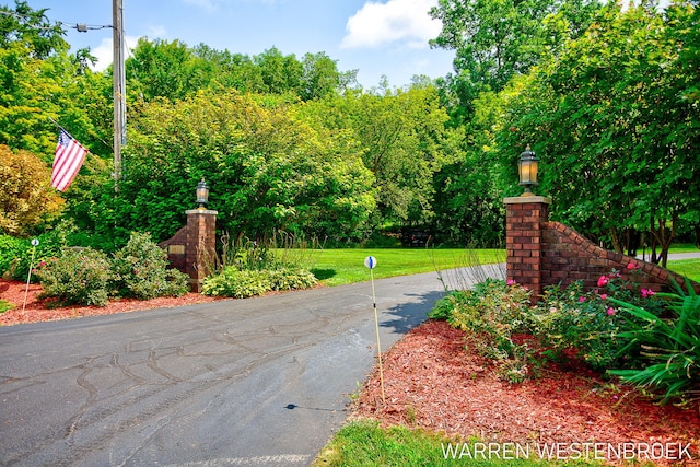 3550 64th Ave, Zeeland, MI 49464 - view of asphalt road featuring street lighting