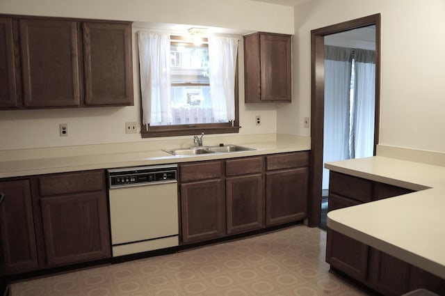 8449 Mathias Dr Unit 17, Grosse Ile, MI 48138 - kitchen with dishwasher, a sink, light countertops, dark brown cabinets, and light flooring
