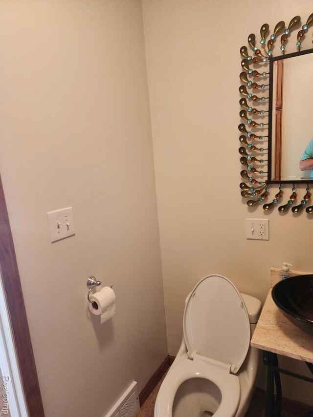 5140 Eastview Rd, Clarkston, MI 48346 - bathroom featuring vanity and toilet