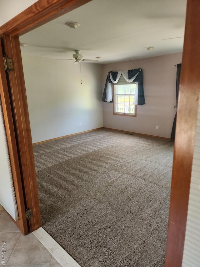 5140 Eastview Rd, Clarkston, MI 48346 - spare room featuring carpet floors and ceiling fan