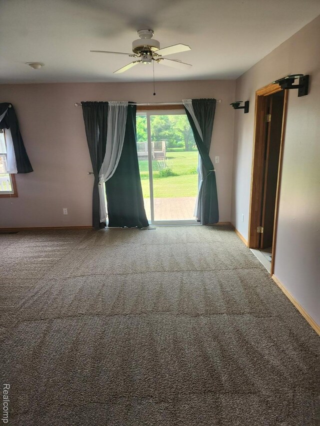 5140 Eastview Rd, Clarkston, MI 48346 - spare room with carpet floors and ceiling fan