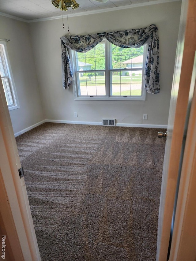 5140 Eastview Rd, Clarkston, MI 48346 - empty room featuring carpet flooring and crown molding