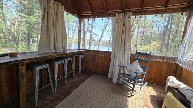 sunroom with plenty of natural light