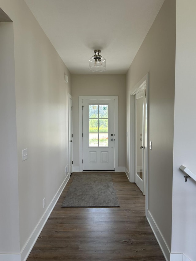 6669 Yamoto Way Lot 7, Douglas, MI 49406 - doorway featuring baseboards and dark wood-style floors
