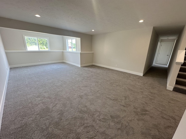 6669 Yamoto Way Lot 7, Douglas, MI 49406 - spare room with dark colored carpet, recessed lighting, and a textured ceiling