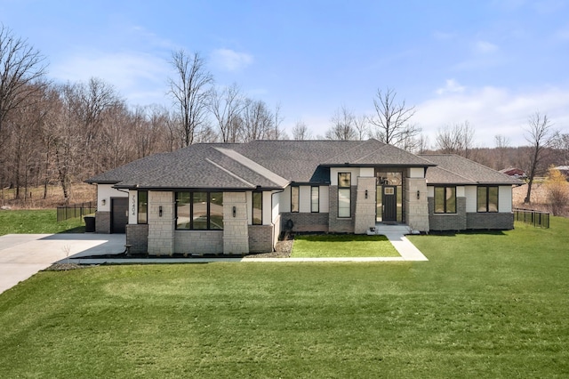 73404 Castle, Armada, MI 48005 - view of front facade featuring driveway, roof with shingles, and brick siding