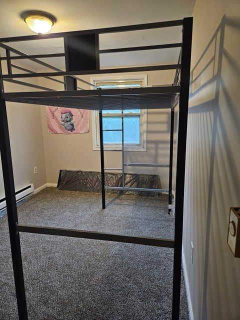 22419 Hoffman St, Saint Clair Shores, MI 48082 - unfurnished bedroom featuring baseboards