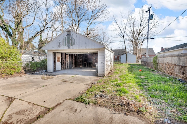 detached garage with fence
