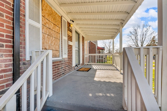 view of patio featuring a porch