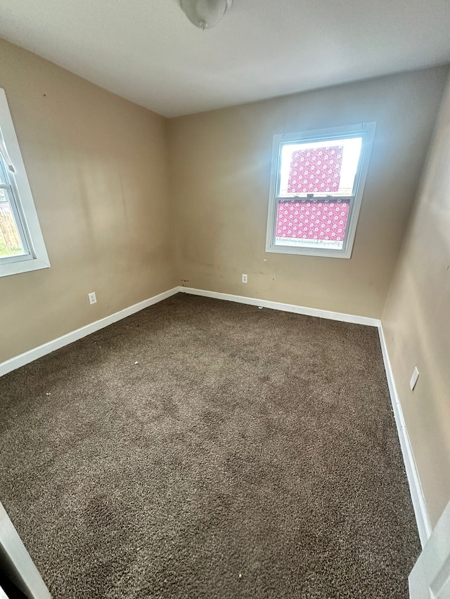 15913 Petoskey Ave, Detroit, MI 48238 - carpeted empty room with baseboards