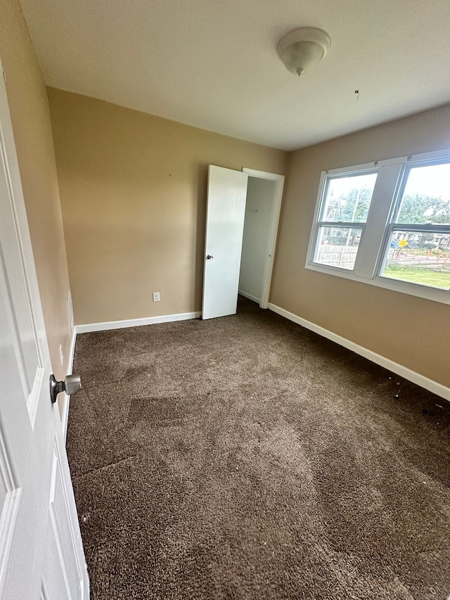 15913 Petoskey Ave, Detroit, MI 48238 - unfurnished bedroom featuring carpet flooring and baseboards