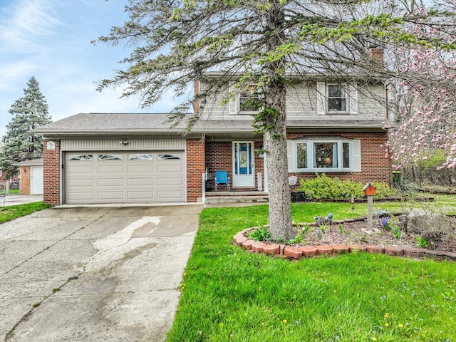 826 Hendricks Dr, Monroe, MI 48162 - traditional home featuring concrete driveway, a chimney, a front lawn, an attached garage, and brick siding