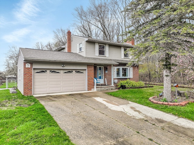 826 Hendricks Dr, Monroe, MI 48162 - traditional-style house with a chimney, a front lawn, driveway, brick siding, and a garage
