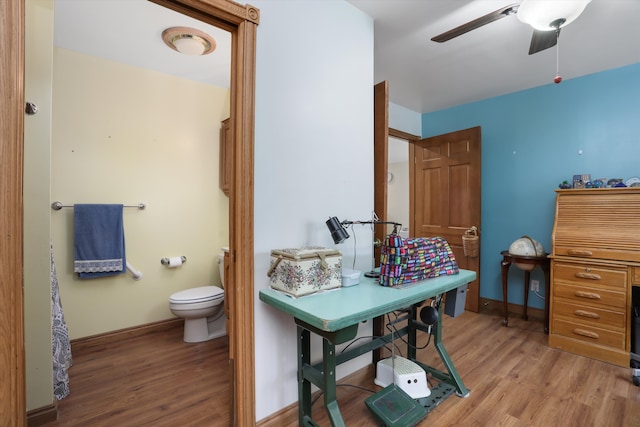 826 Hendricks Dr, Monroe, MI 48162 - bathroom featuring ceiling fan, toilet, wood finished floors, and baseboards