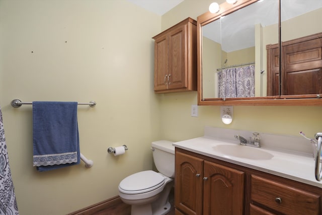 826 Hendricks Dr, Monroe, MI 48162 - bathroom featuring toilet and vanity