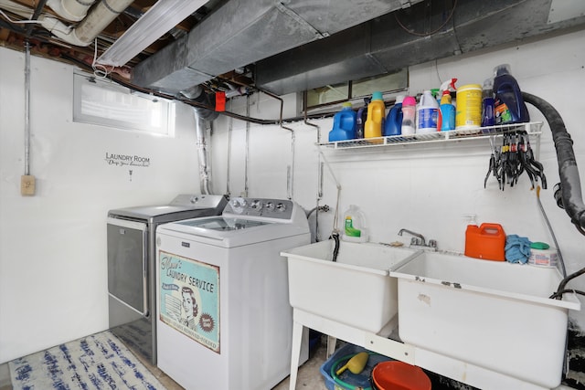826 Hendricks Dr, Monroe, MI 48162 - clothes washing area with washing machine and dryer, a sink, and laundry area