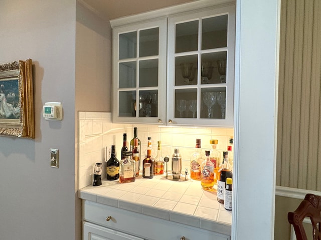 bar with backsplash and a bar