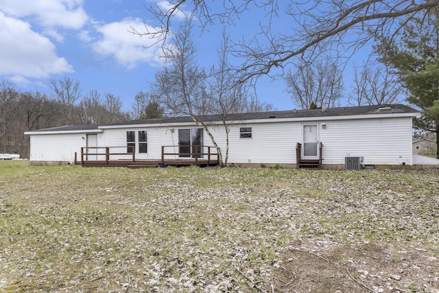 back of property with a deck, cooling unit, and entry steps