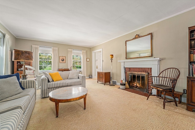living area featuring crown molding, light colored carpet, a fireplace, and baseboards