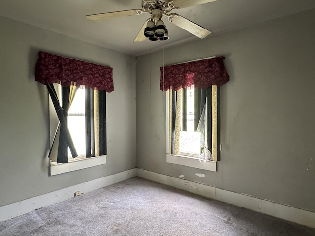 613 E Van Wagoner Ave, Flint, MI 48505 - carpeted spare room with plenty of natural light and ceiling fan