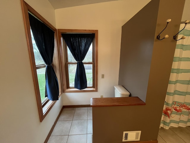 34722 36th Ave, Paw Paw, MI 49079 - hall with light tile patterned floors and baseboards