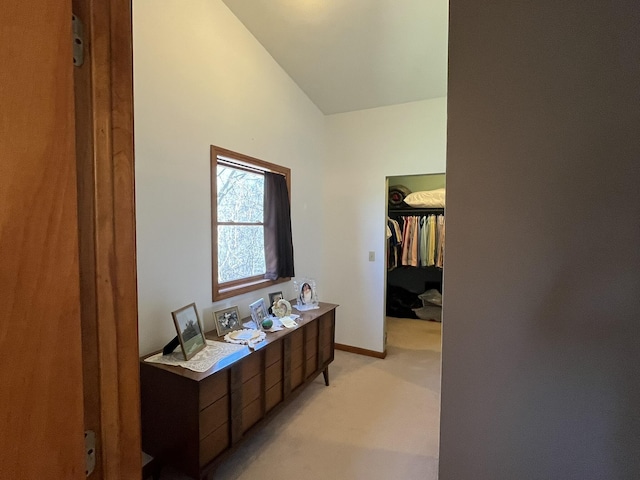 34722 36th Ave, Paw Paw, MI 49079 - bathroom featuring baseboards and high vaulted ceiling