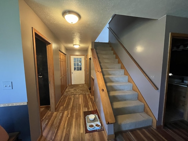 34722 36th Ave, Paw Paw, MI 49079 - stairs with wood finished floors and a textured ceiling