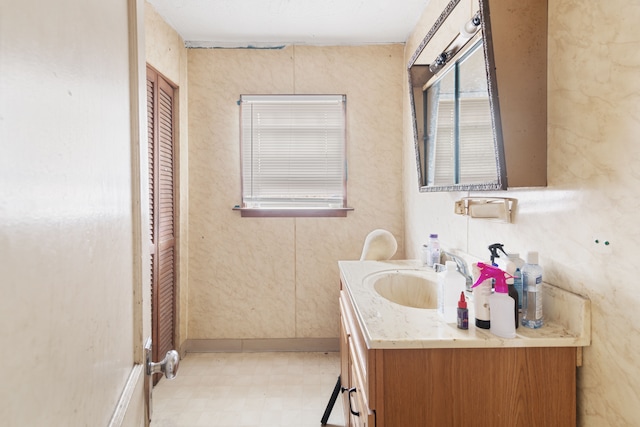 bathroom with vanity and tile patterned floors