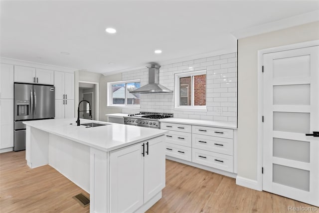 3761 Campbell St, Dearborn, MI 48124 - kitchen with stainless steel fridge, wall chimney exhaust hood, light countertops, tasteful backsplash, and white cabinets