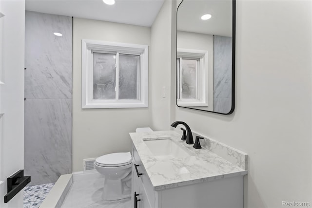 3761 Campbell St, Dearborn, MI 48124 - bathroom with vanity, a stall shower, and marble finish flooring