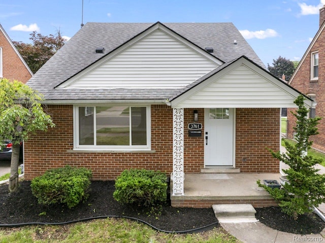3761 Campbell St, Dearborn, MI 48124 - bungalow-style house with brick siding and roof with shingles