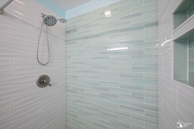 bathroom featuring tiled shower