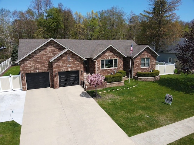 5652 N Lake Dr, Kimball, MI 48074 - ranch-style home with brick siding, driveway, roof with shingles, and an attached garage