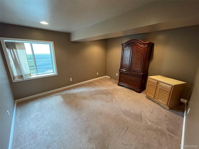 5652 N Lake Dr, Kimball, MI 48074 - empty room with light colored carpet and baseboards