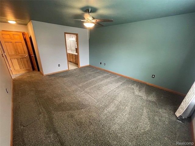 5652 N Lake Dr, Kimball, MI 48074 - unfurnished bedroom featuring carpet flooring, baseboards, and ensuite bath