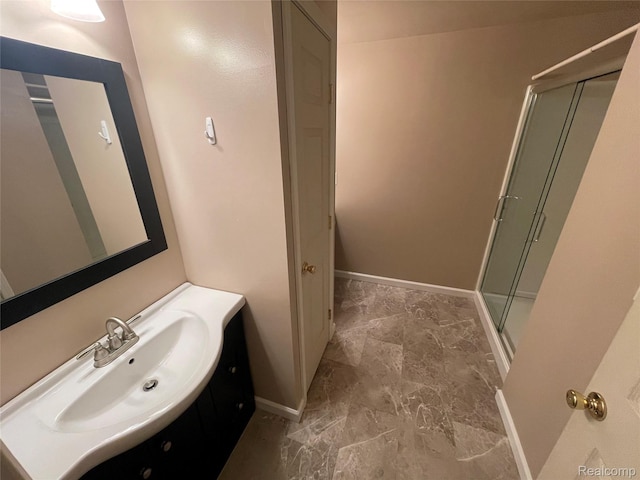 5652 N Lake Dr, Kimball, MI 48074 - full bathroom featuring vanity, a stall shower, and marble look tile flooring